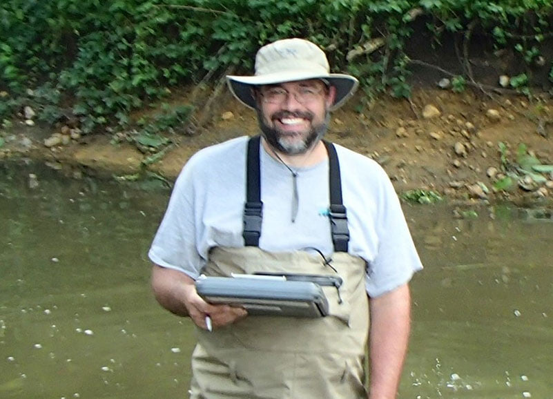 blair standing by stream