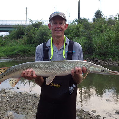 man holding a gar