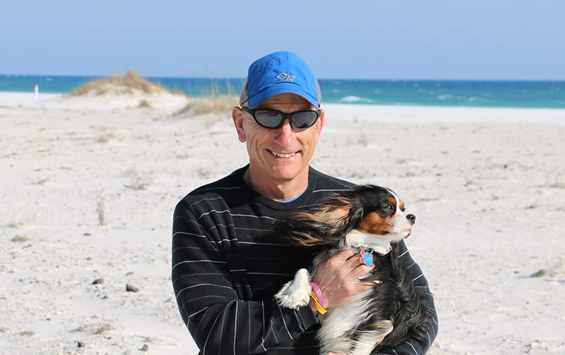 mick micacchion holding a dog