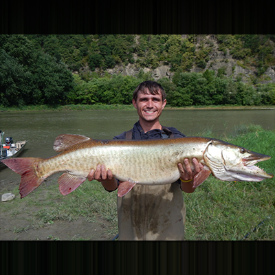 man holding a large fish